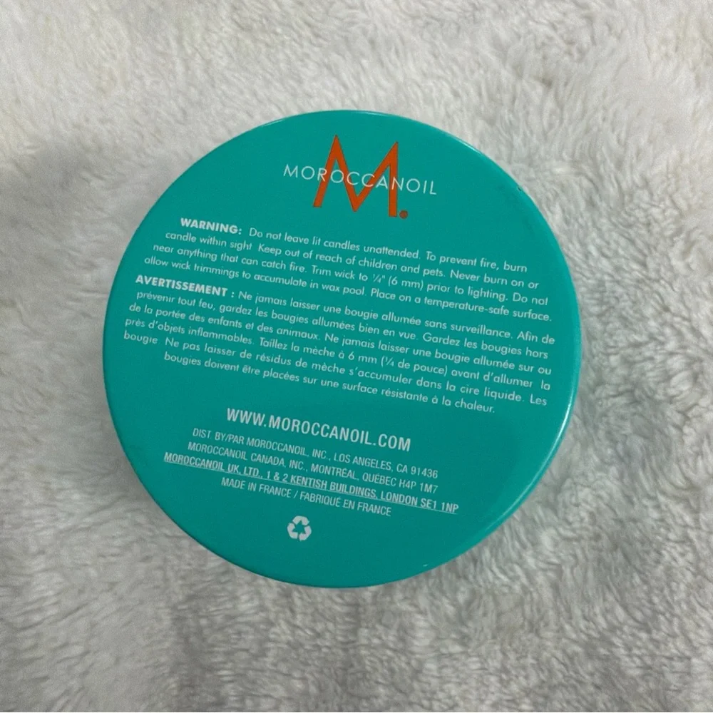 Moroccanoil Scented Candle Tin - Teal with Orange Logo